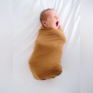 Copper Pearl camel knit swaddle blanket